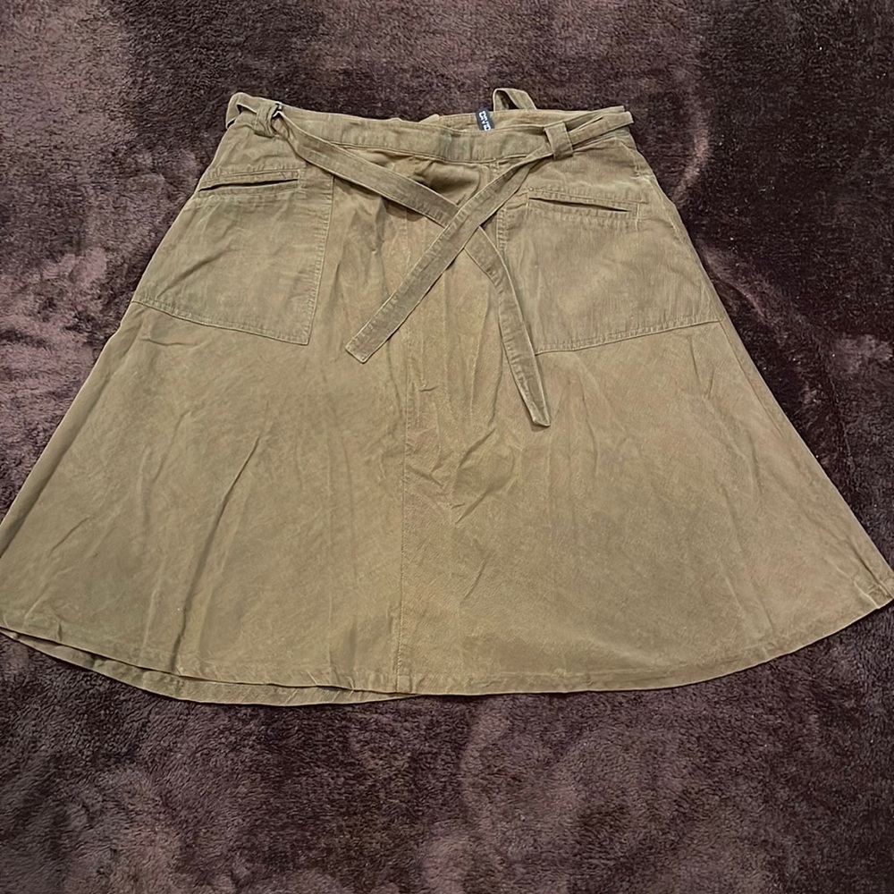 Asymmetrical corduroy brown skirt. Size 12.